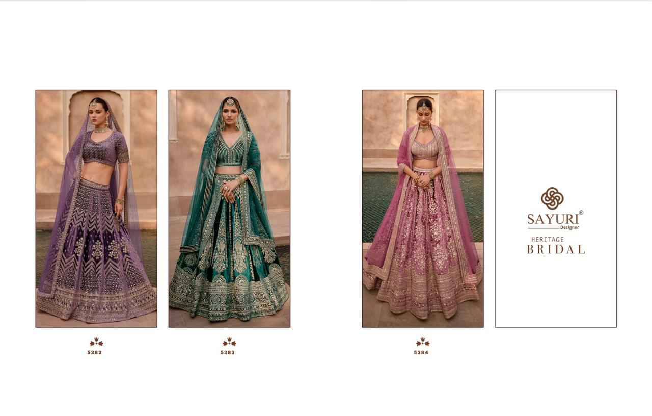 Heritage Bridal By Sayuri 5382 To 5384 Series Designer Beautiful Navratri Collection Occasional Wear & Party Wear Pure Viscose Lycra Lehengas At Wholesale Price