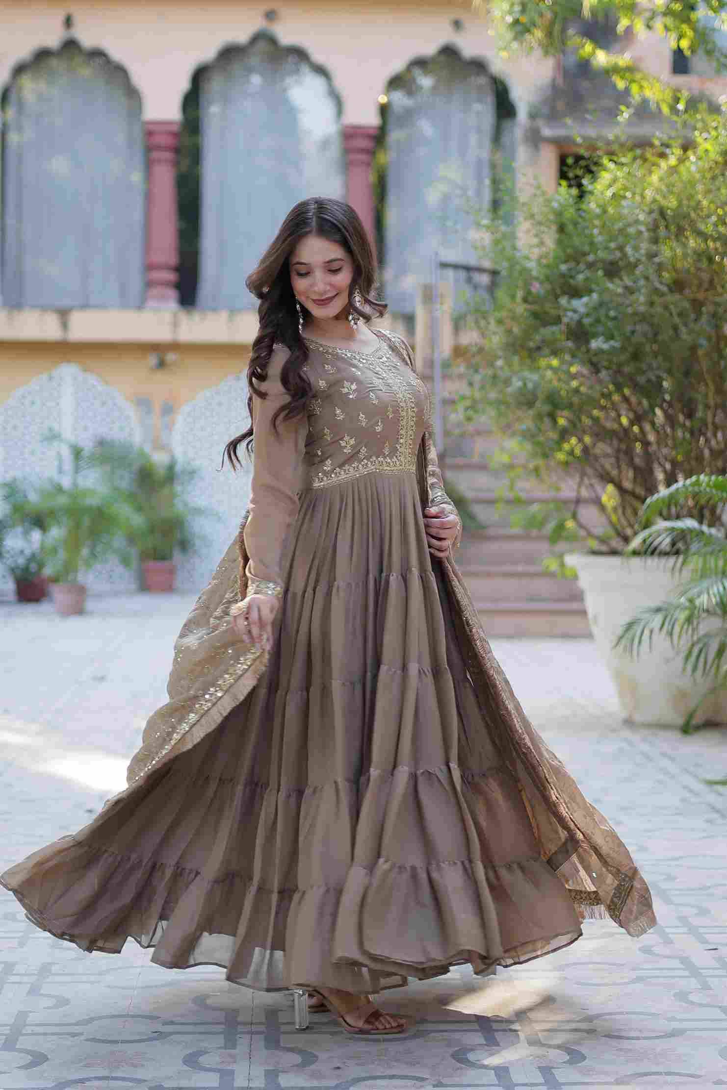 Sf-1004 By Fashid Wholesale 01 To 04 Series Designer Beautiful Collection Occasional Wear & Party Wear Star Georgette Gowns At Wholesale Price