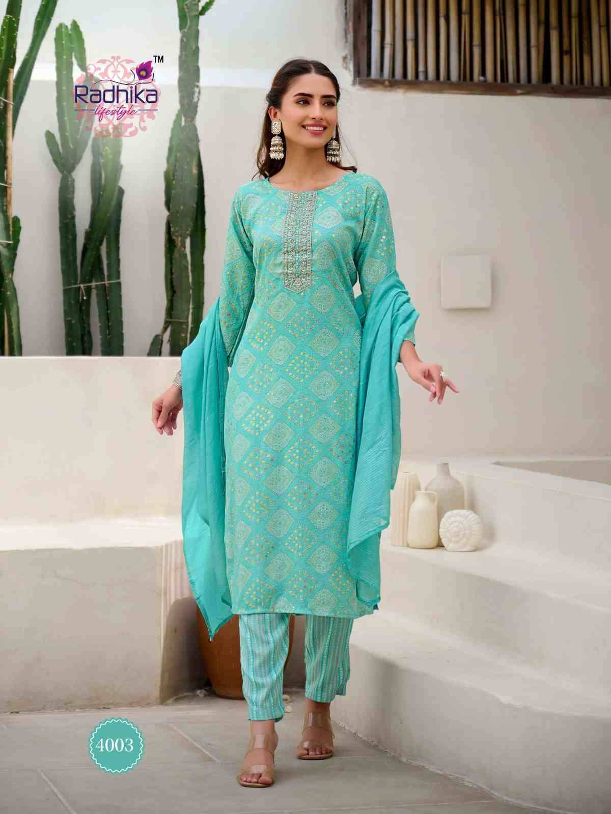 Siri Vol-4 By Radhika Lifestyle 4001 To 4008 Series Beautiful Festive Suits Colorful Stylish Fancy Casual Wear & Ethnic Wear Rayon Print With Work Dresses At Wholesale Price