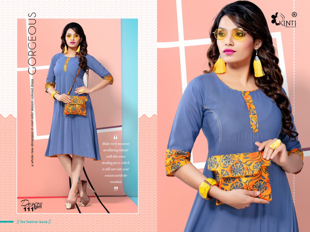 Desi Girl Vol-1 By Kinti 101 To 112 Series Indian Traditional Wear Collection Beautiful Stylish Fancy Colorful Party Wear & Occasional Wear Rayon Print Kurtis With Purse At Wholesale Price