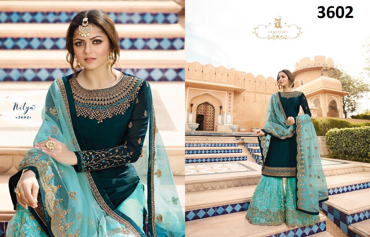 Nitya Hit Designs By Lt Fabric Suits Collection Beautiful Stylish Fancy Colorful Party Wear & Occasional Wear Satin Georgette Dresses At Wholesale Price