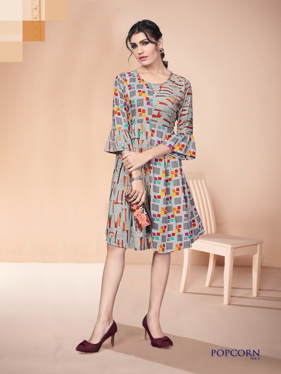 Popcorn Vol-2 By Watermelon 1001 To 1008 Series Beautiful Colorful Stylish Fancy Casual Wear & Ethnic Wear & Ready To Wear Heavy Rayon Printed Kurtis With Belt At Wholesale Price