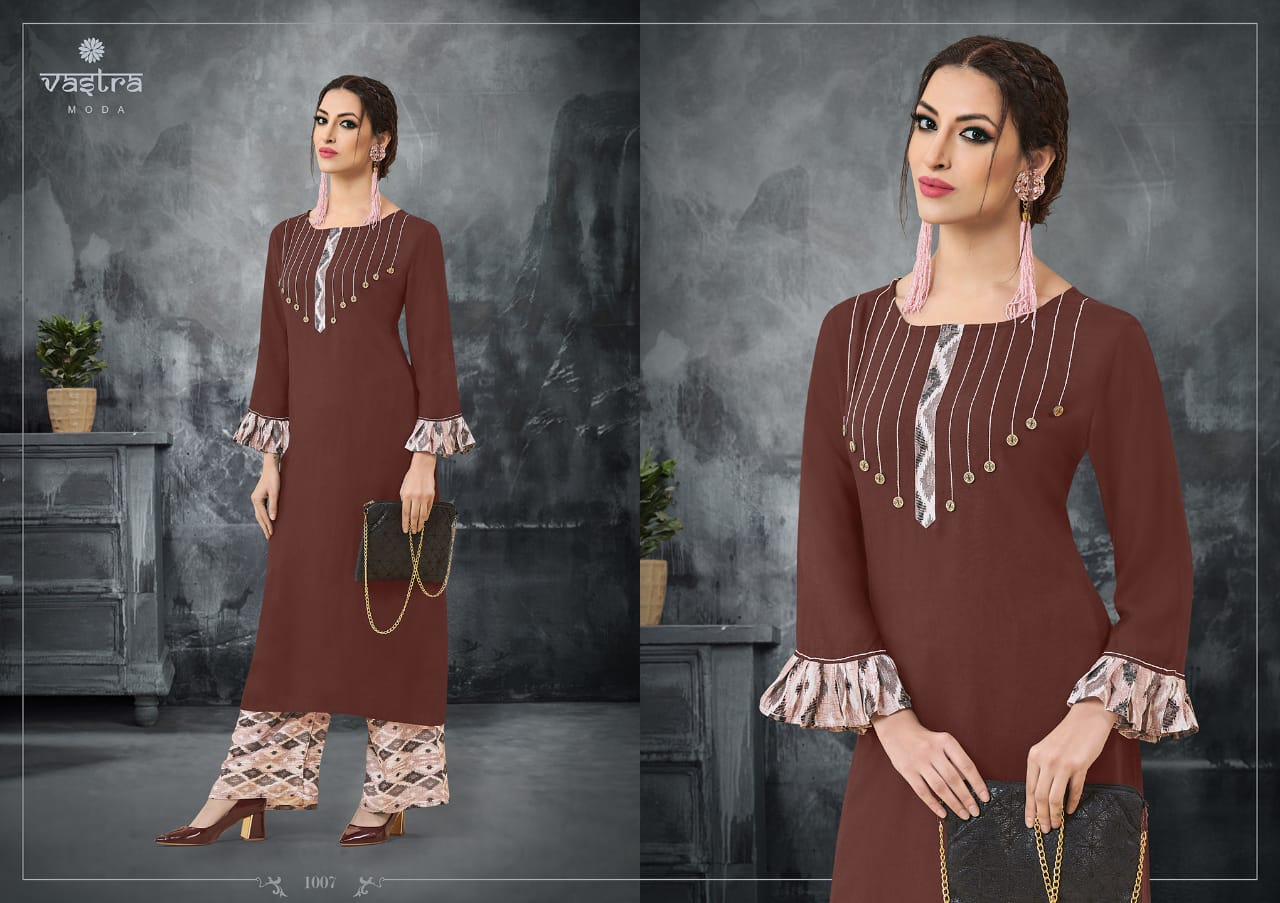 Rhythm Vol-1 By Vastra Moda 1001 To 1008 Series Beautiful Colorful Stylish Fancy Casual Wear & Ethnic Wear & Ready To Wear Premium Rayon Printed Kurtis With Palazzo At Wholesale Price